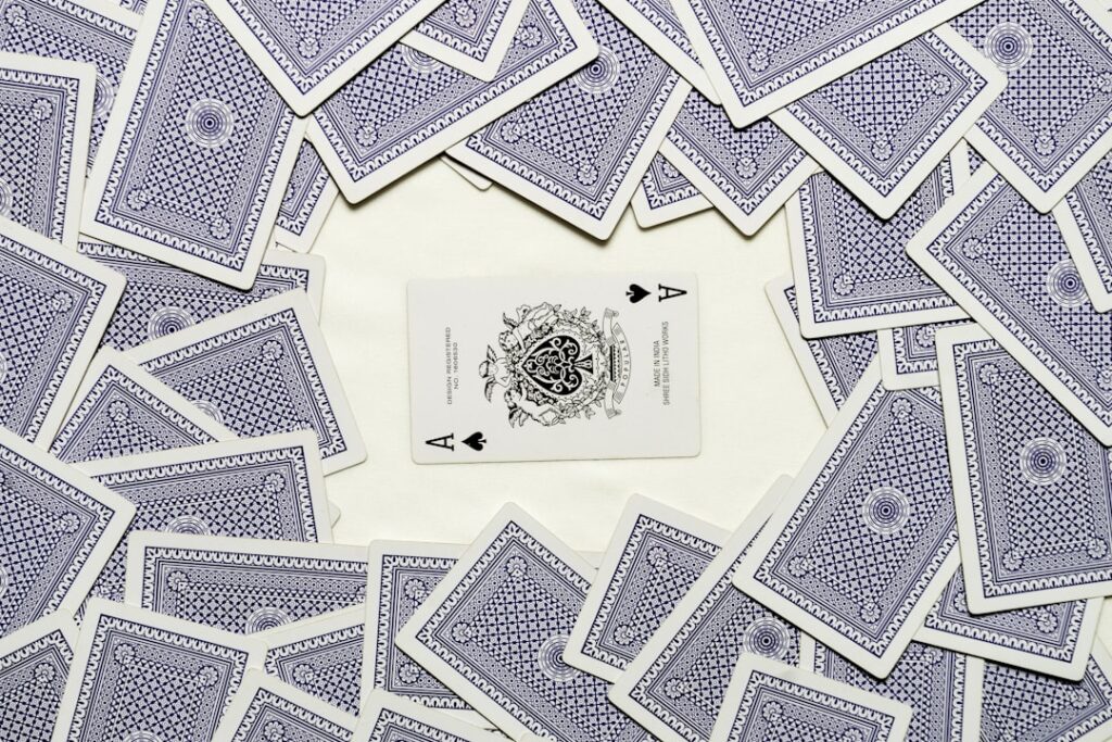 A spade ace is surrounded by card backs